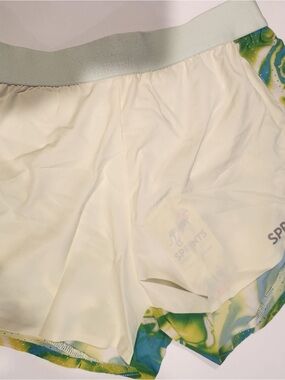 Sprints Women's Cream Athletic Shorts with Green Patterned Trim